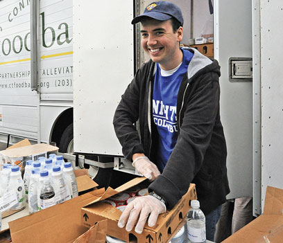 Young Knight volunteering at Food Bank